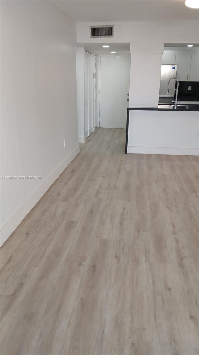 9682 Fontainebleau Boulevard, Unit 312 Miami, FL 33172 - Photo 21 of 33 a view of a kitchen with a sink