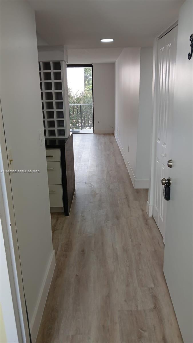 9682 Fontainebleau Boulevard, Unit 312 Miami, FL 33172 - Photo 27 of 33 en empty room with windows