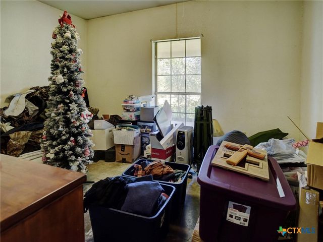 a room with furniture workspace and a window