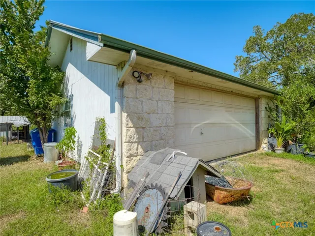 a backyard of a house with seating space