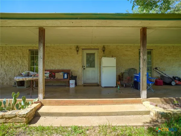 a view of a building with a patio