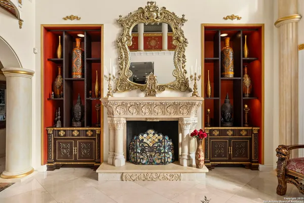 a living room with furniture a window and storage