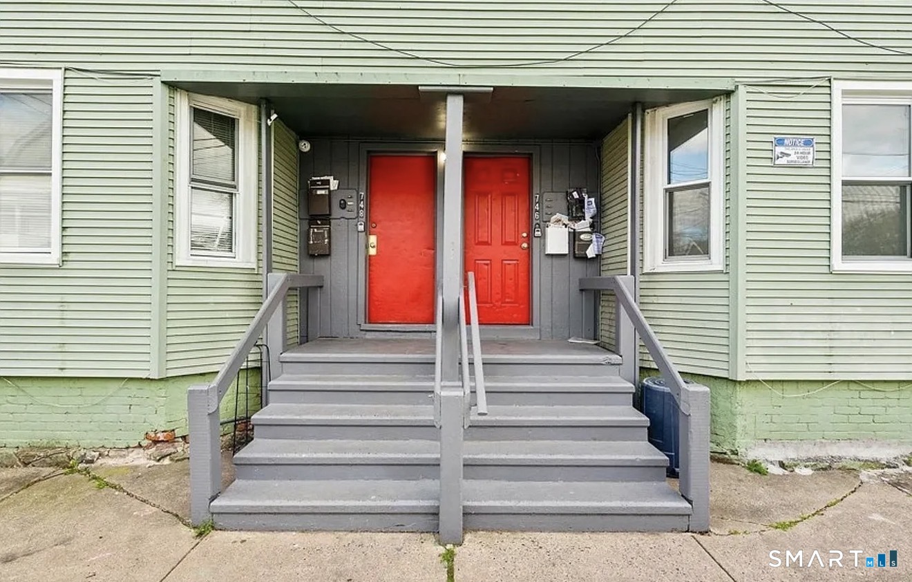 748 Maple Street, Unit 3 Bridgeport, CT 06608 - Photo 12 of 13 a front view of a house with entryway