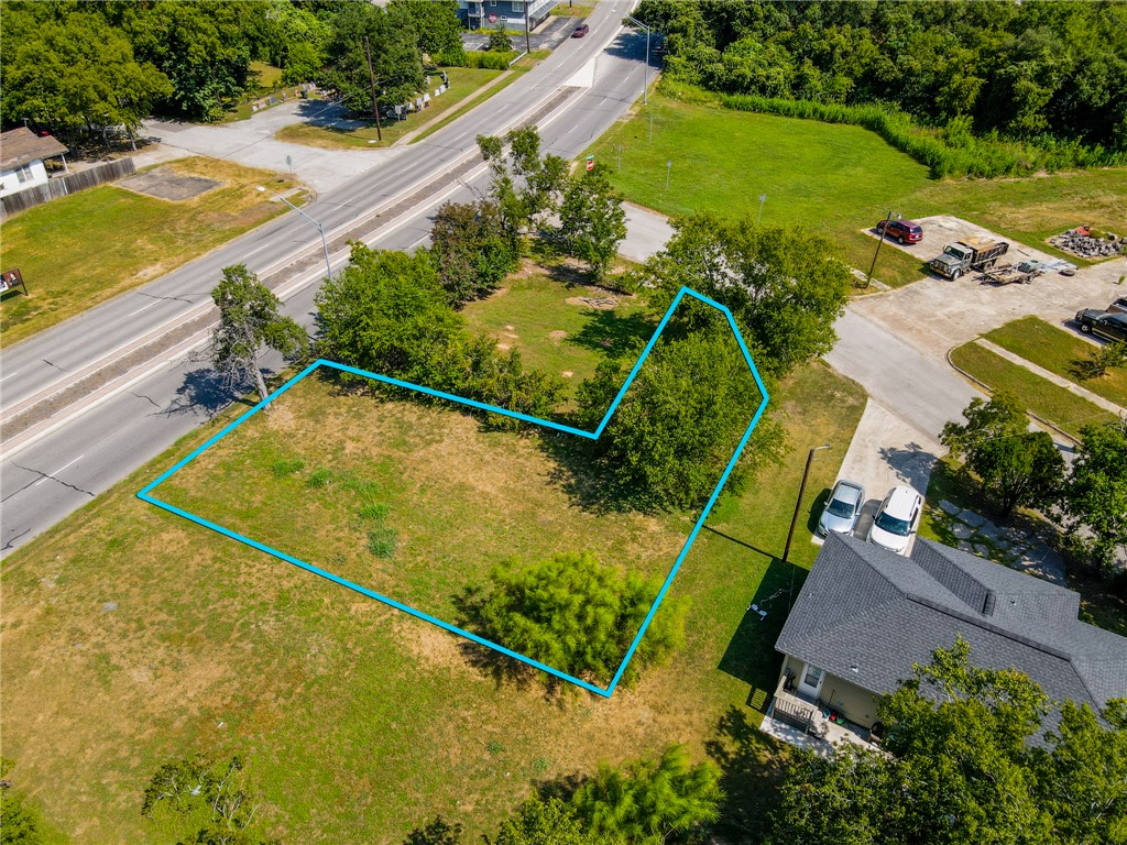 905 North Texas Avenue Bryan, TX 77803 - Photo 1 of 10 an aerial view of a residential houses with outdoor space and swimming pool