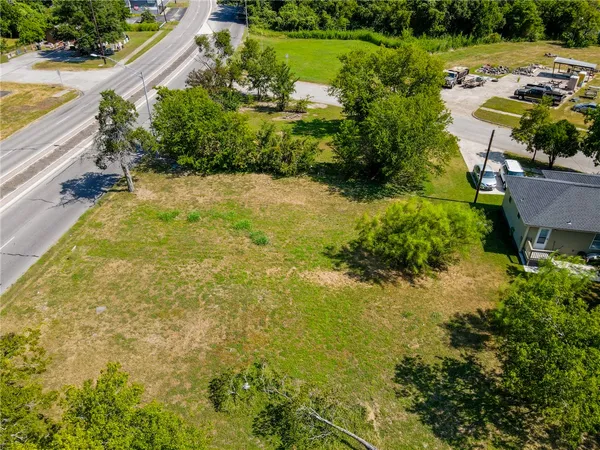a view of a lake with a yard