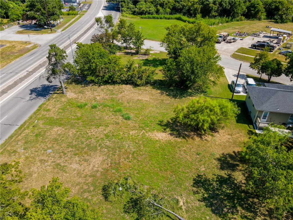 905 North Texas Avenue Bryan, TX 77803 - Photo 5 of 10 a view of a lake with a yard