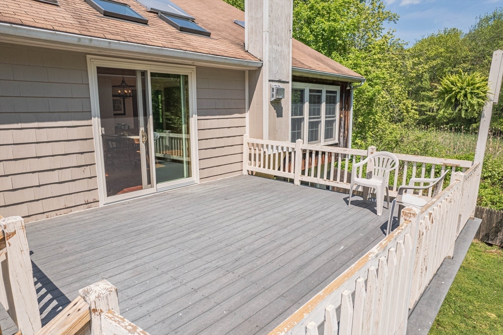 29 Prospect Road Andover, MA 01810 - Photo 3 of 7 a view of a house with wooden deck