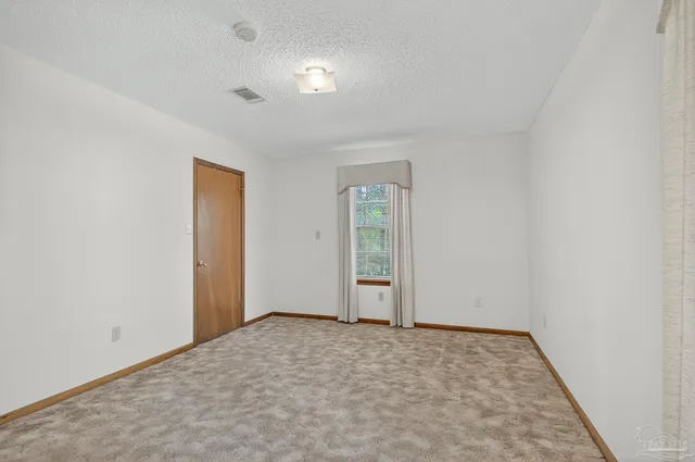 an empty room with a natural light