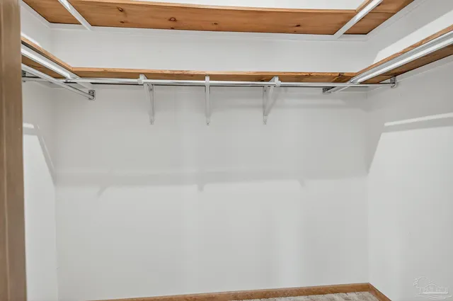 a view of a room with racks on the wall