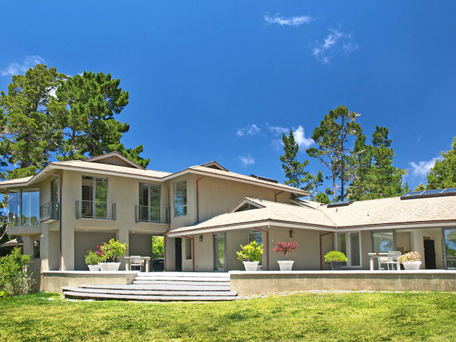 a front view of house with yard