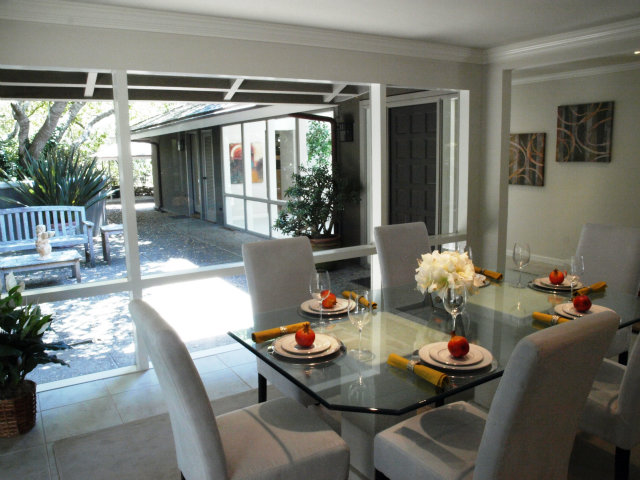 1504 Viscaino Road Pebble Beach, CA 93953 - Photo 16 of 20 a outdoor dining space with furniture and window