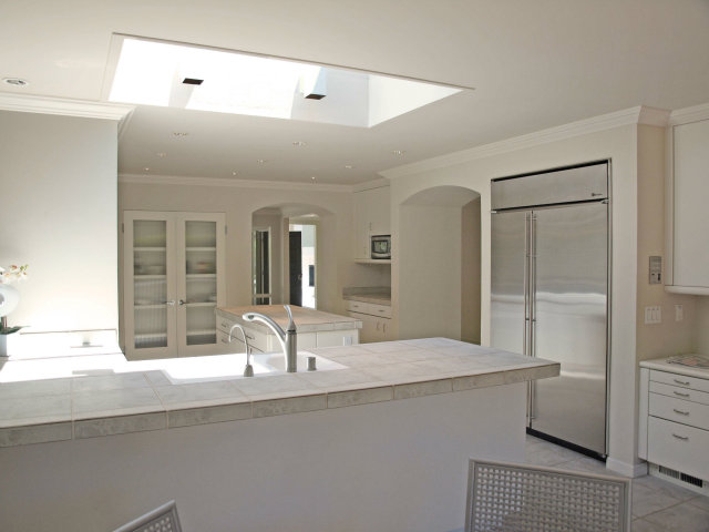 1504 Viscaino Road Pebble Beach, CA 93953 - Photo 18 of 20 a bathroom with a sink and a large mirror