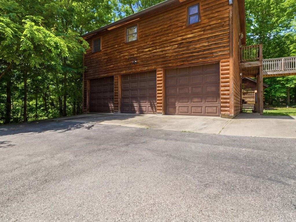1826 Toms Run Road Holbrook, PA 15341 - Photo 3 of 50 Front of Log Garage