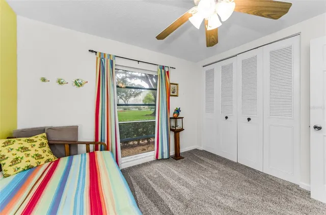 a room with window and rug