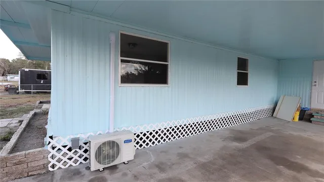 a view of a livingroom with wooden floor