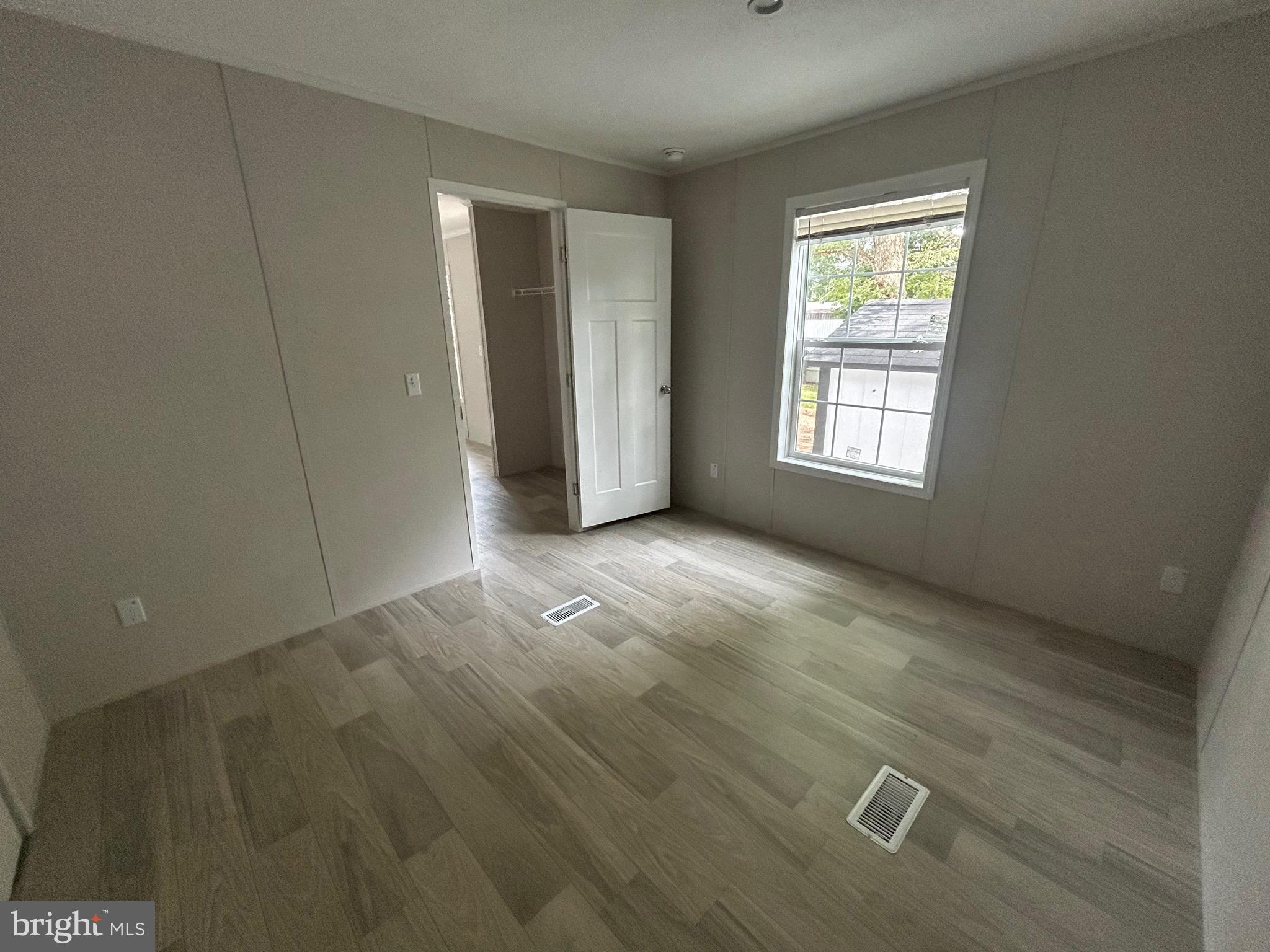 2501 Tilton Road, Unit 312 Egg Harbor Township, NJ 08234 - Photo 12 of 18 an empty room with windows