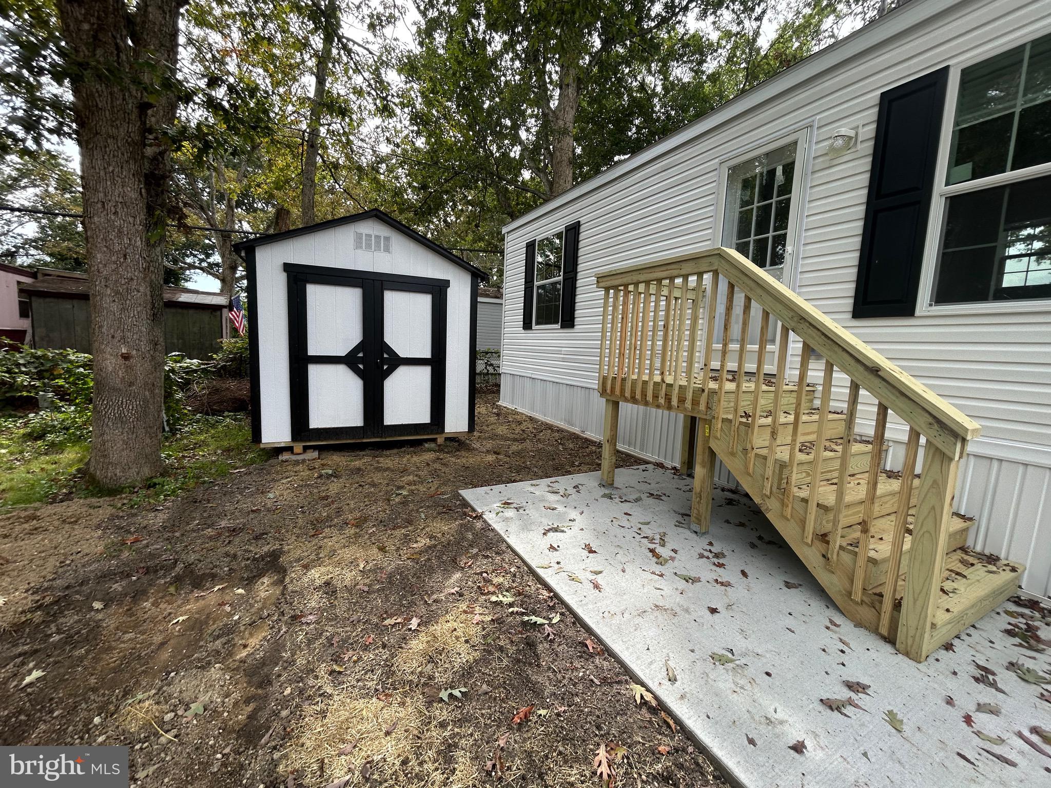 2501 Tilton Road, Unit 312 Egg Harbor Township, NJ 08234 - Photo 3 of 18 a front view of a house with garden