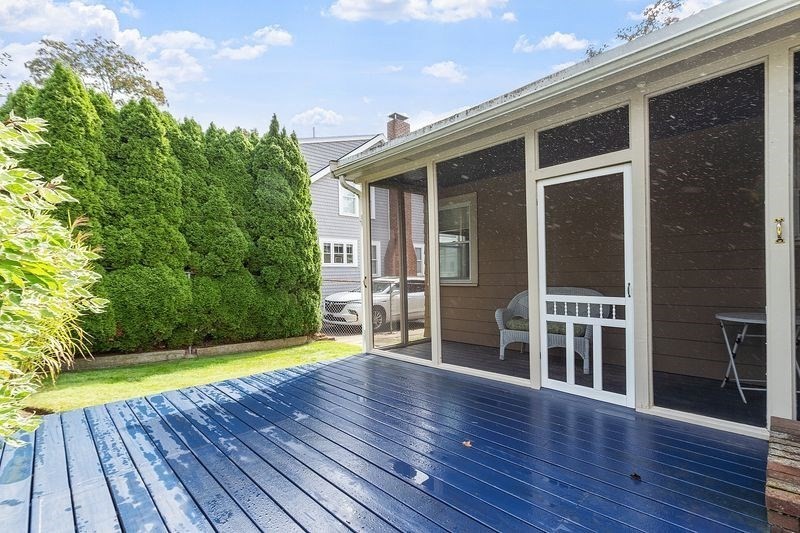 68 Spring Road Nahant, MA 01908 - Photo 16 of 23 a view of an empty room with wooden floor and a yard