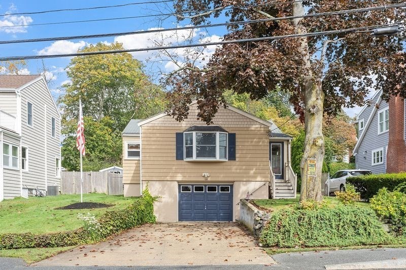 68 Spring Road Nahant, MA 01908 - Photo 2 of 23 a front view of a house with a yard