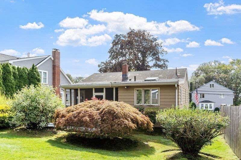 68 Spring Road Nahant, MA 01908 - Photo 22 of 23 a front view of a house with garden