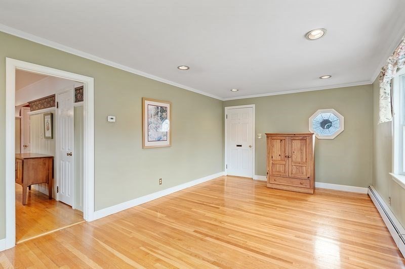 68 Spring Road Nahant, MA 01908 - Photo 5 of 23 a view of empty room with wooden floor