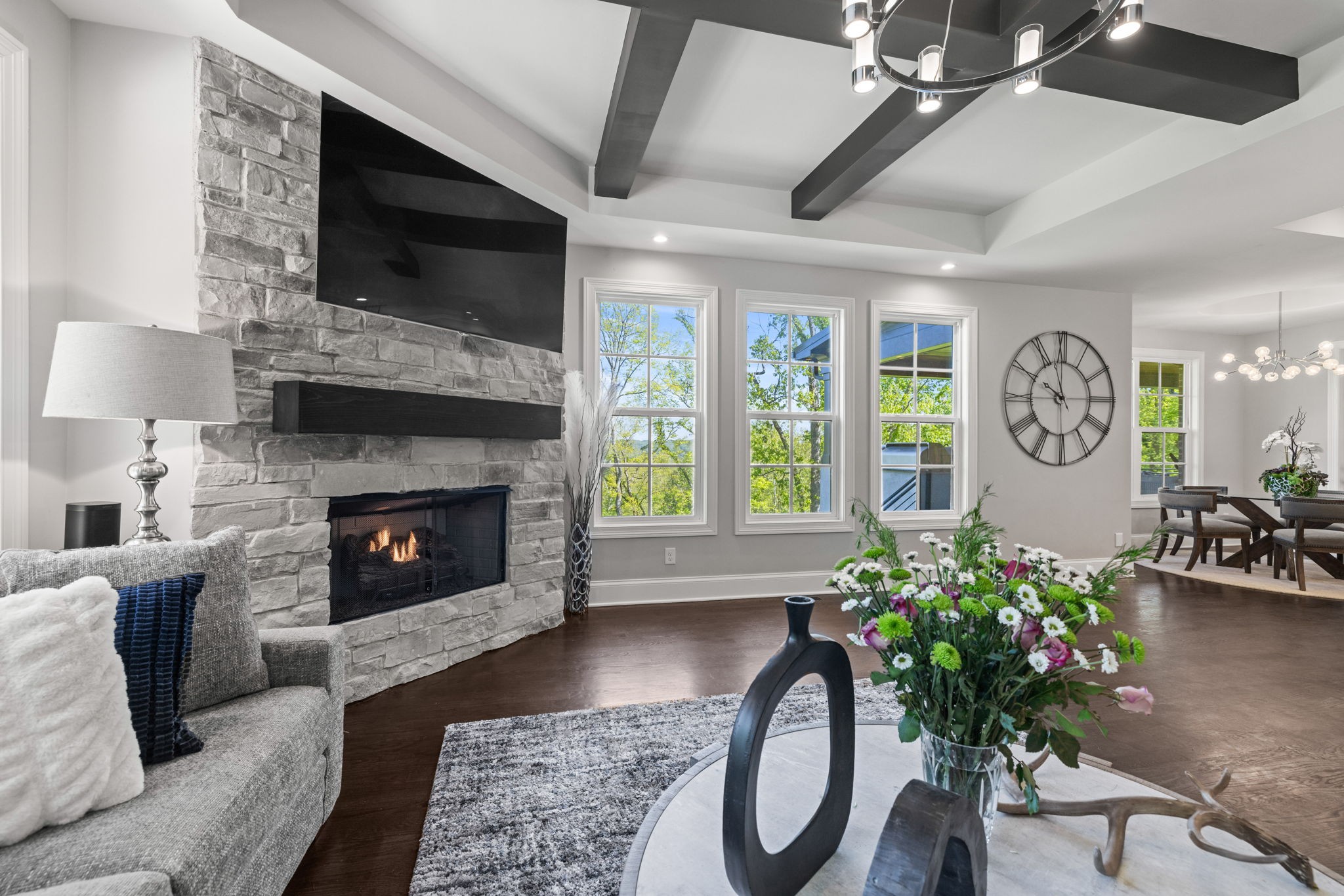 514 Legends Ridge Court Franklin, TN 37069 - Photo 12 of 56 a living room with furniture a flat screen tv and a fireplace
