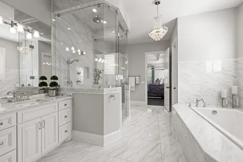 a kitchen with stainless steel appliances a stove a sink and a refrigerator