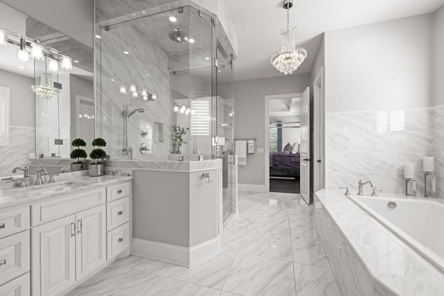 a kitchen with stainless steel appliances a stove a sink and a refrigerator