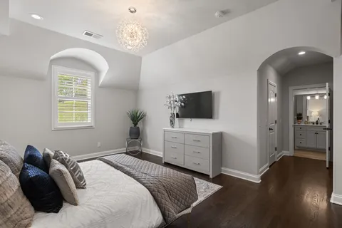 a bathroom with a double vanity sink and mirror