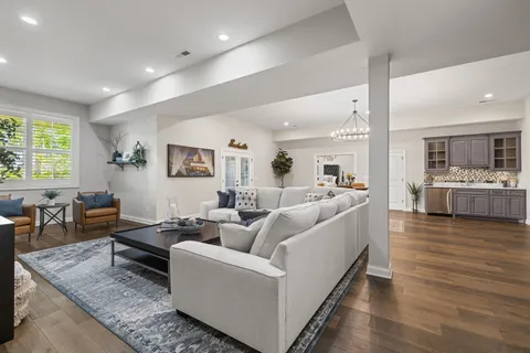 a view of a hallway with a kitchen