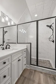 a front view of a house with a yard table and chairs