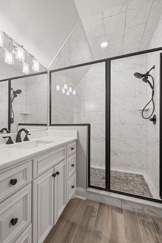 a front view of a house with a yard table and chairs