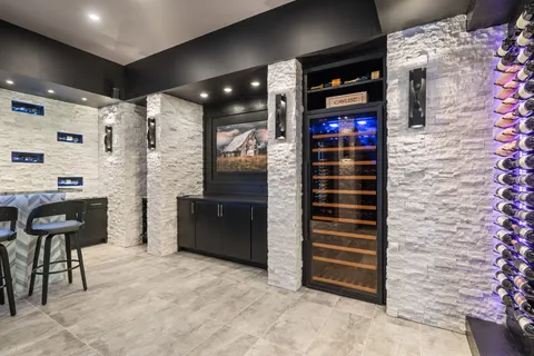 a view of a storage & utility room with two washing machine