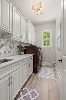 an aerial view of a house with a garden