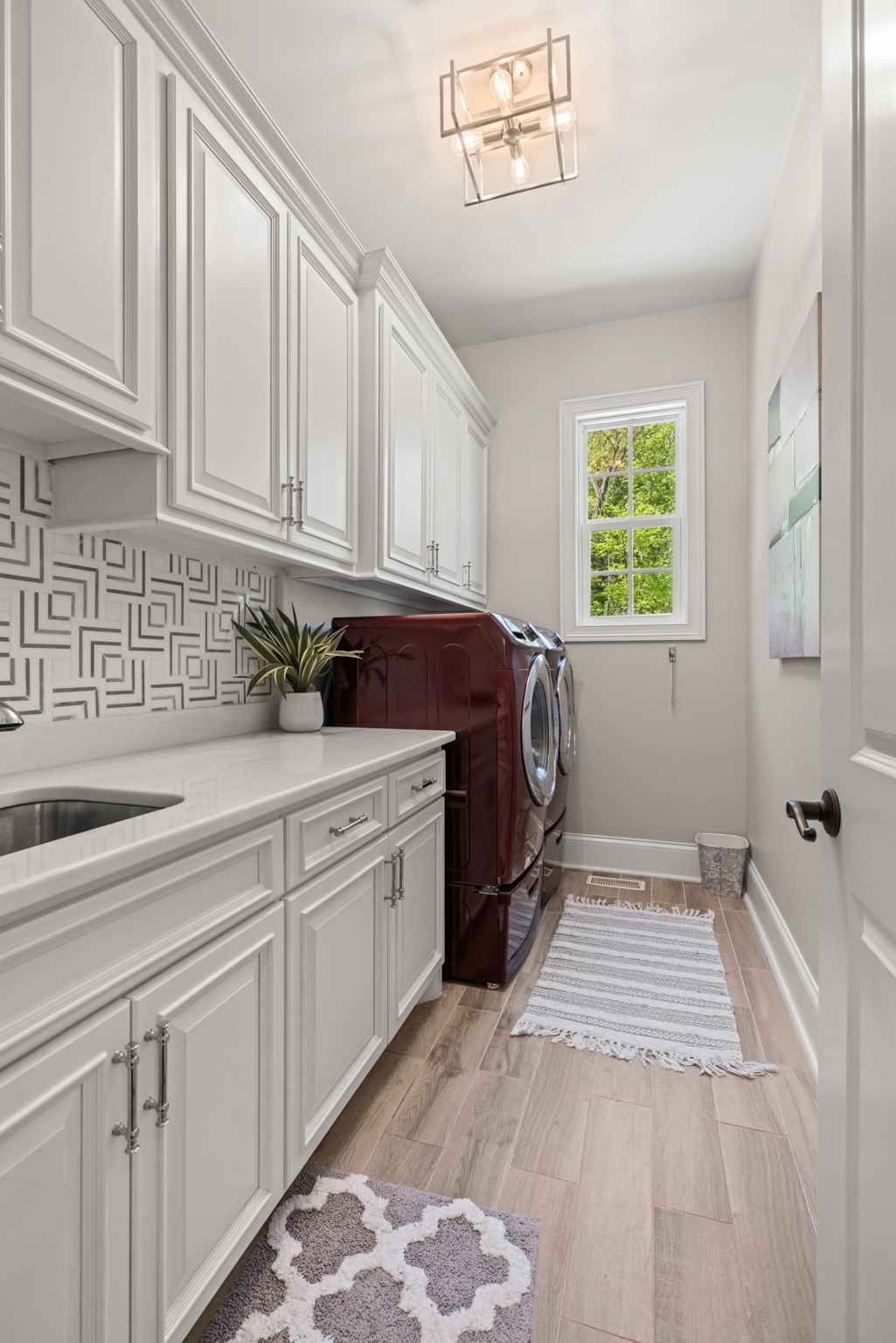 514 Legends Ridge Court Franklin, TN 37069 - Photo 42 of 56 a kitchen with a sink and cabinets