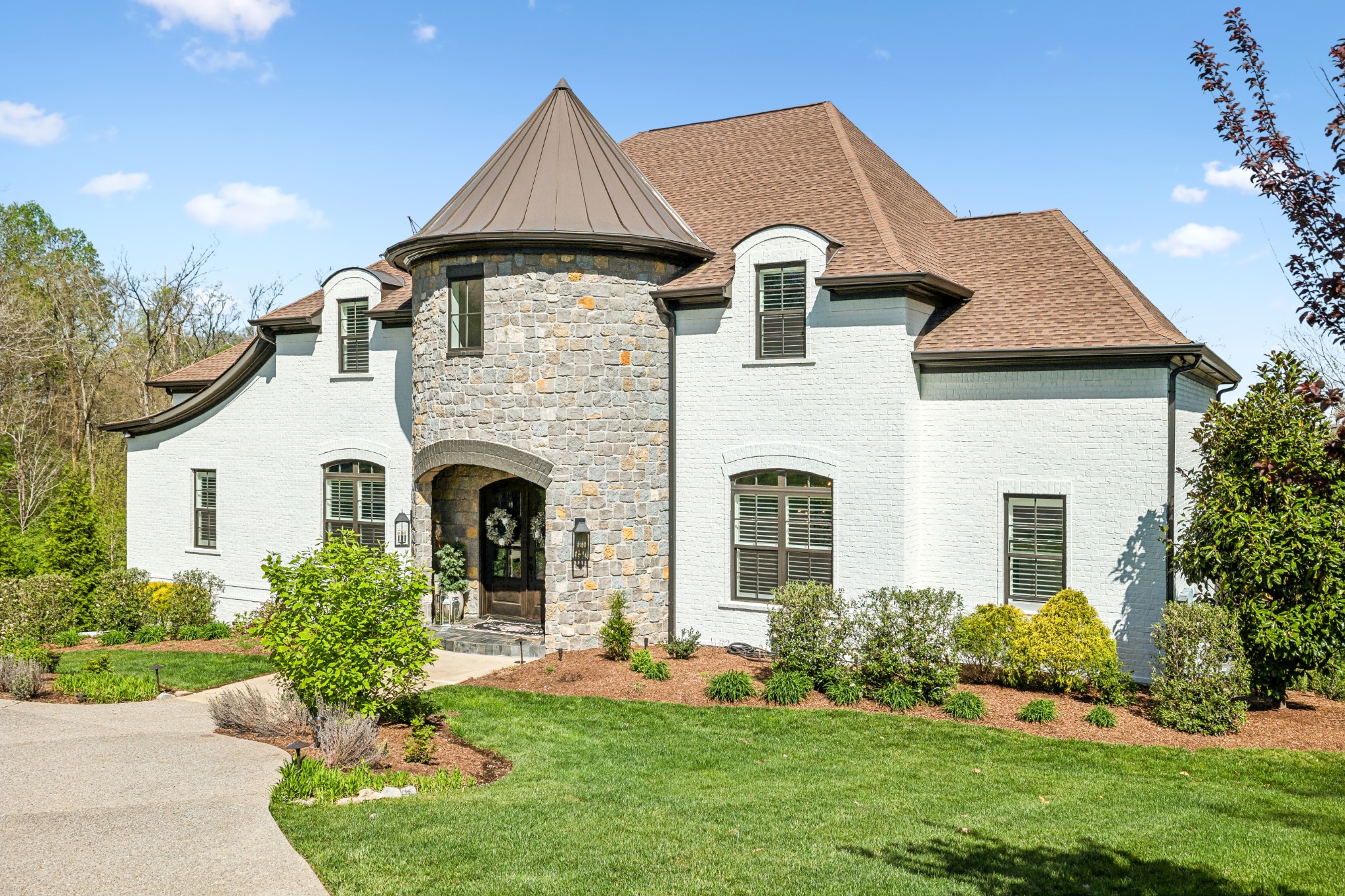 514 Legends Ridge Court Franklin, TN 37069 - Photo 44 of 56 a front view of a house with a yard and garage