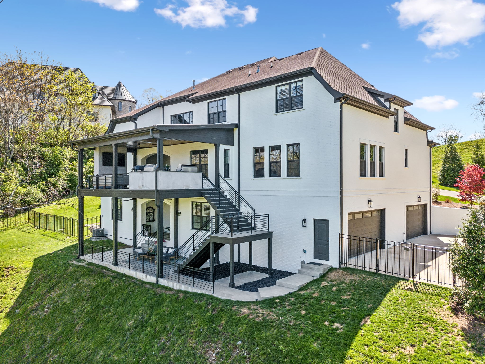 514 Legends Ridge Court Franklin, TN 37069 - Photo 45 of 56 a front view of a house with a yard table and chairs
