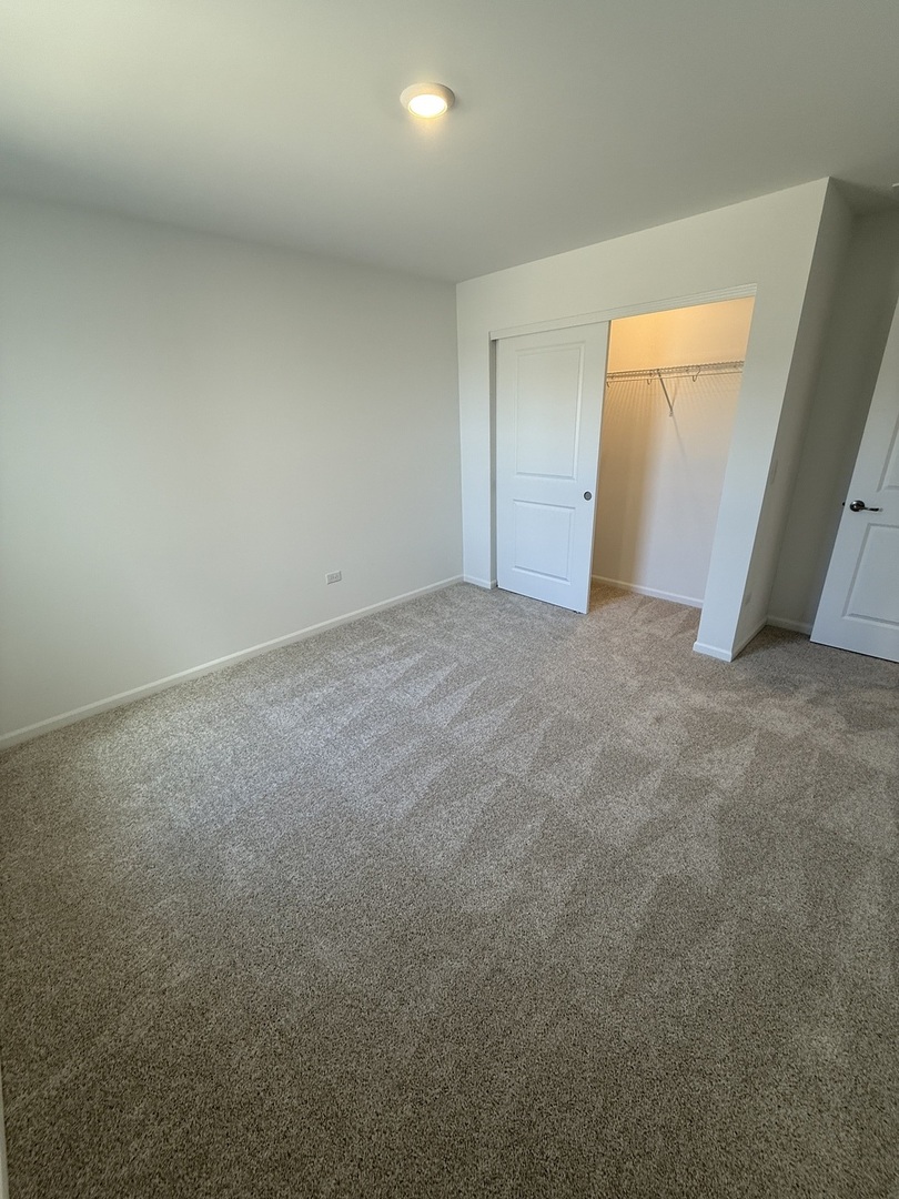 10232 McMahon Way, Unit 10232 Huntley, IL 60142 - Photo 16 of 22 a view of an empty room
