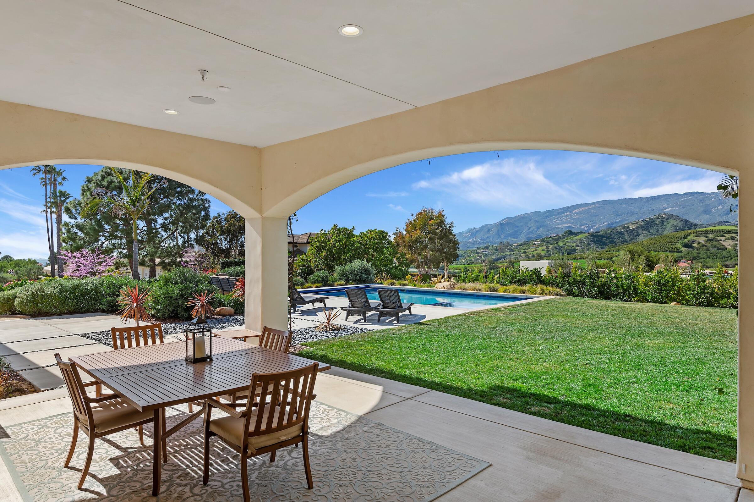 1367 Via Veneto Santa Barbara, CA 93111 - Photo 30 of 38 a view of a patio with a table and chairs