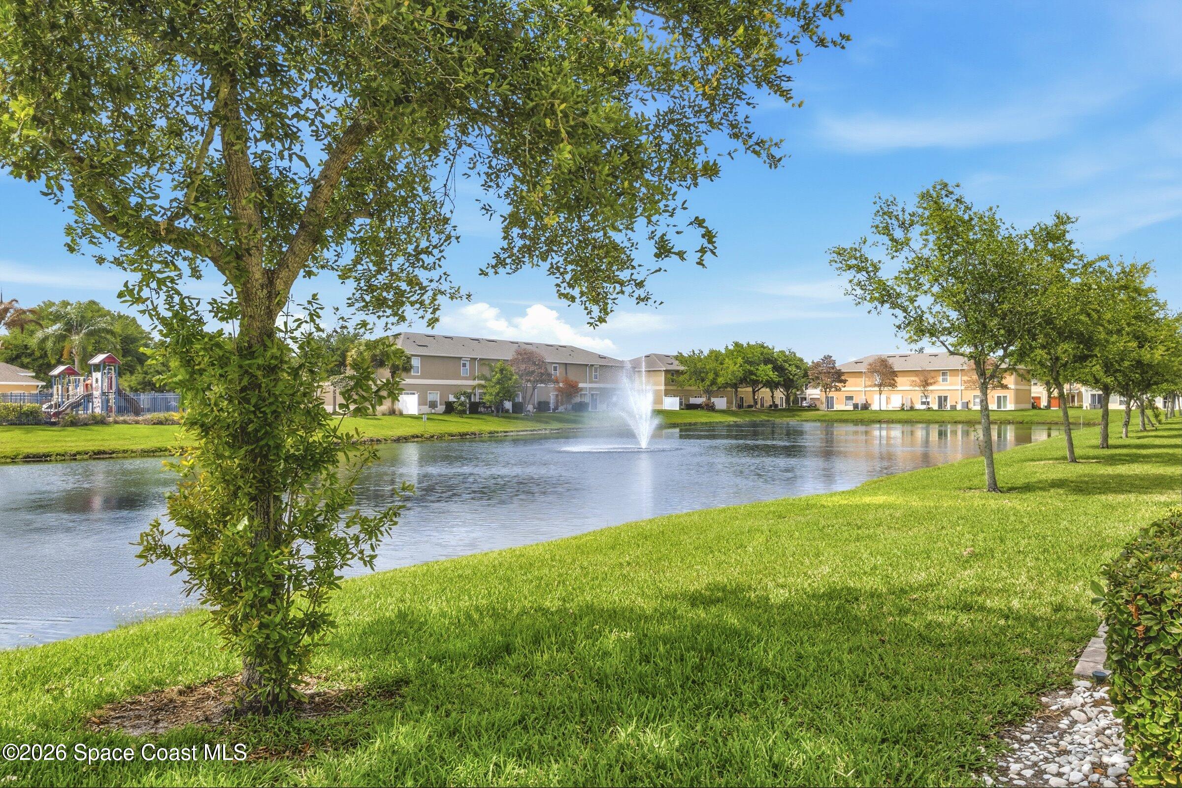 2780 Reston Street, Unit 105 Melbourne, FL 32935 - Photo 12 of 32 a view of a yard with plants and trees