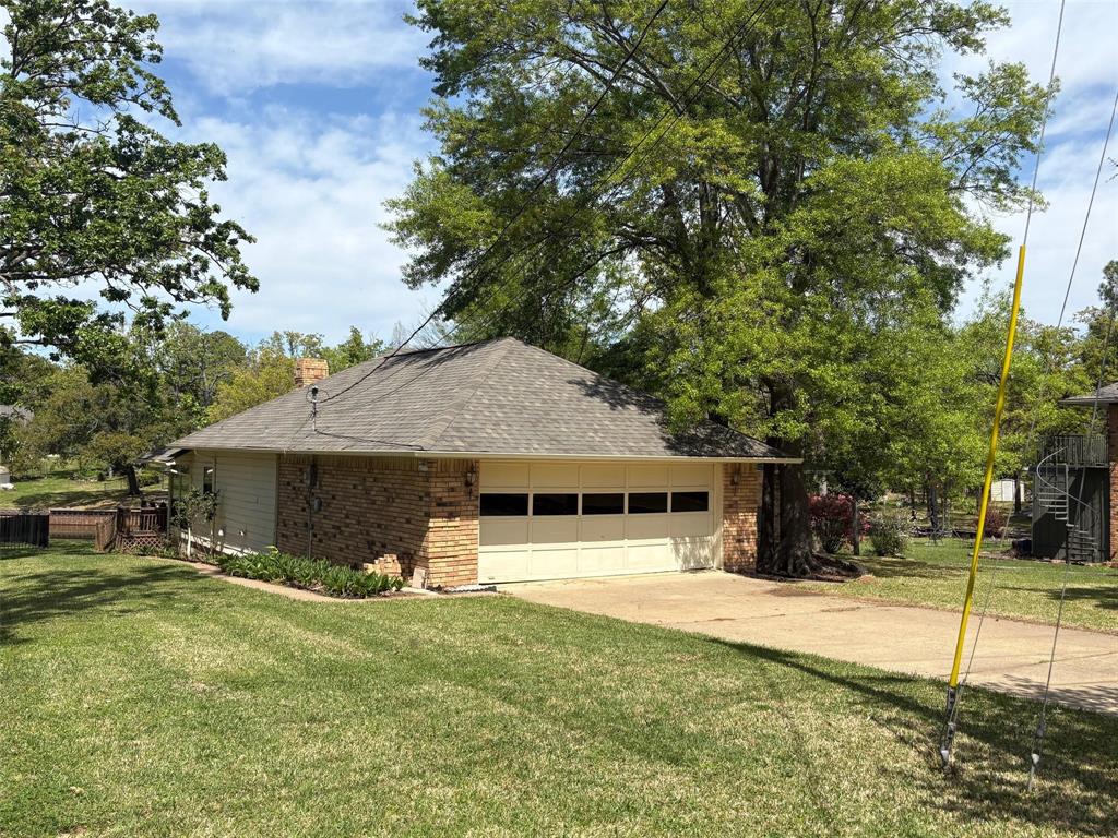 27 Sundown Trail Star Harbor, TX 75148 - Photo 26 of 32 a front view of a house with a yard