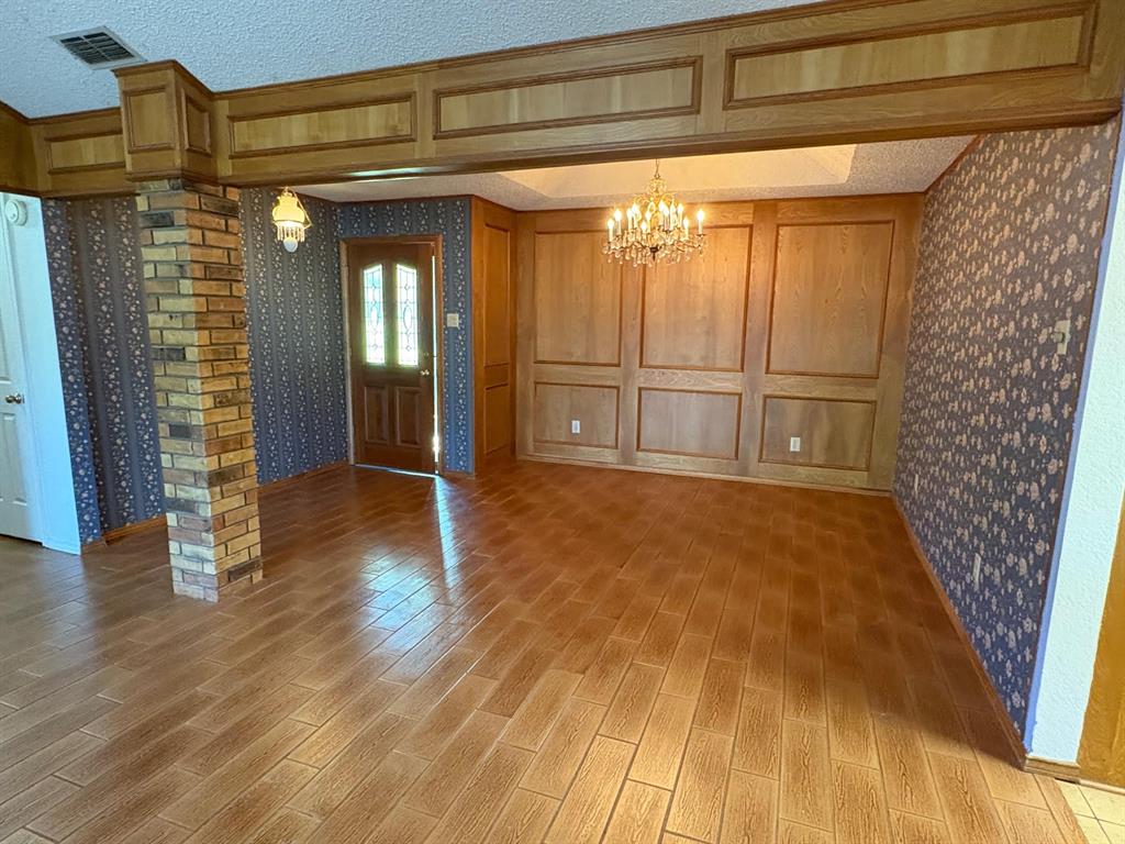 27 Sundown Trail Star Harbor, TX 75148 - Photo 4 of 32 a view of entryway with wooden floor