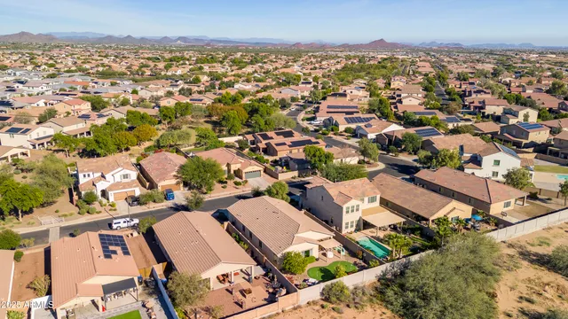 an aerial view of residential building and parking space