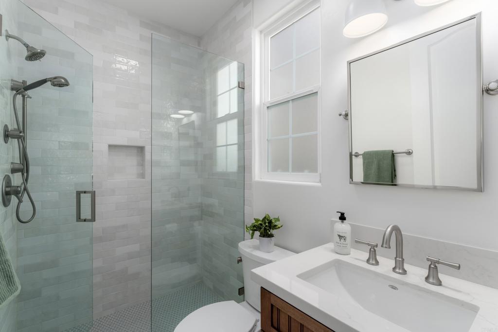 1483 Neptune Avenue Encinitas, CA 92024 - Photo 40 of 46 a bathroom with a sink toilet and shower