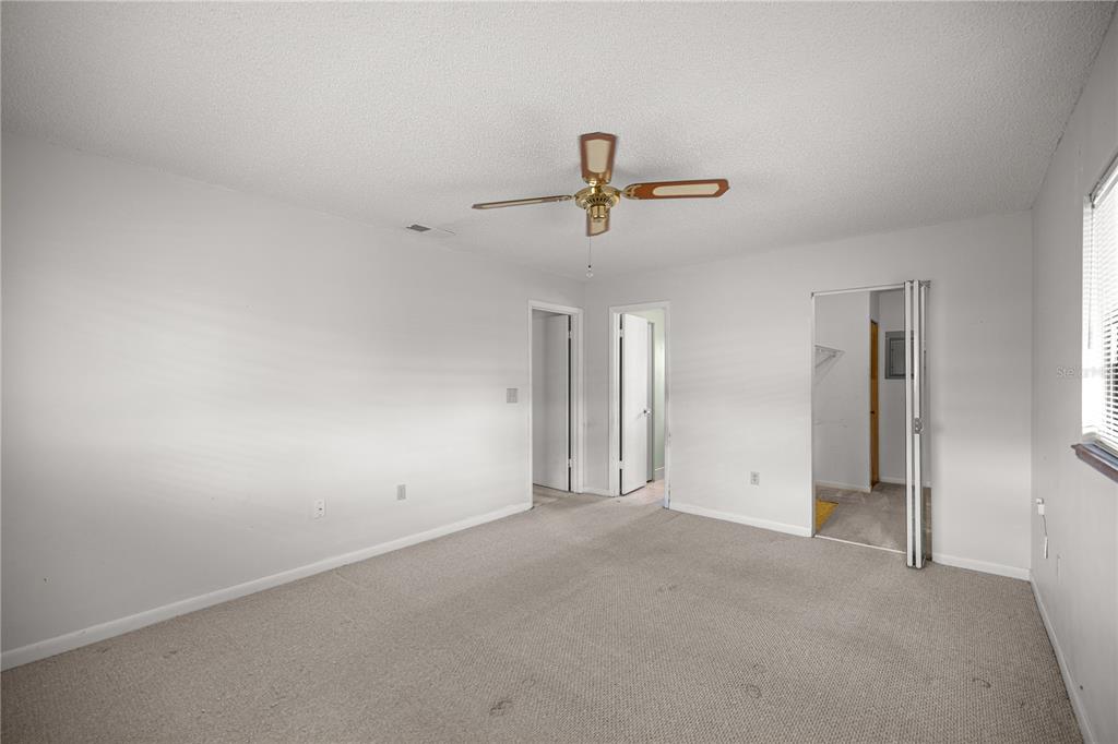 9230 Southwest 101st Lane Ocala, FL 34481 - Photo 15 of 31 a view of room with ceiling fan