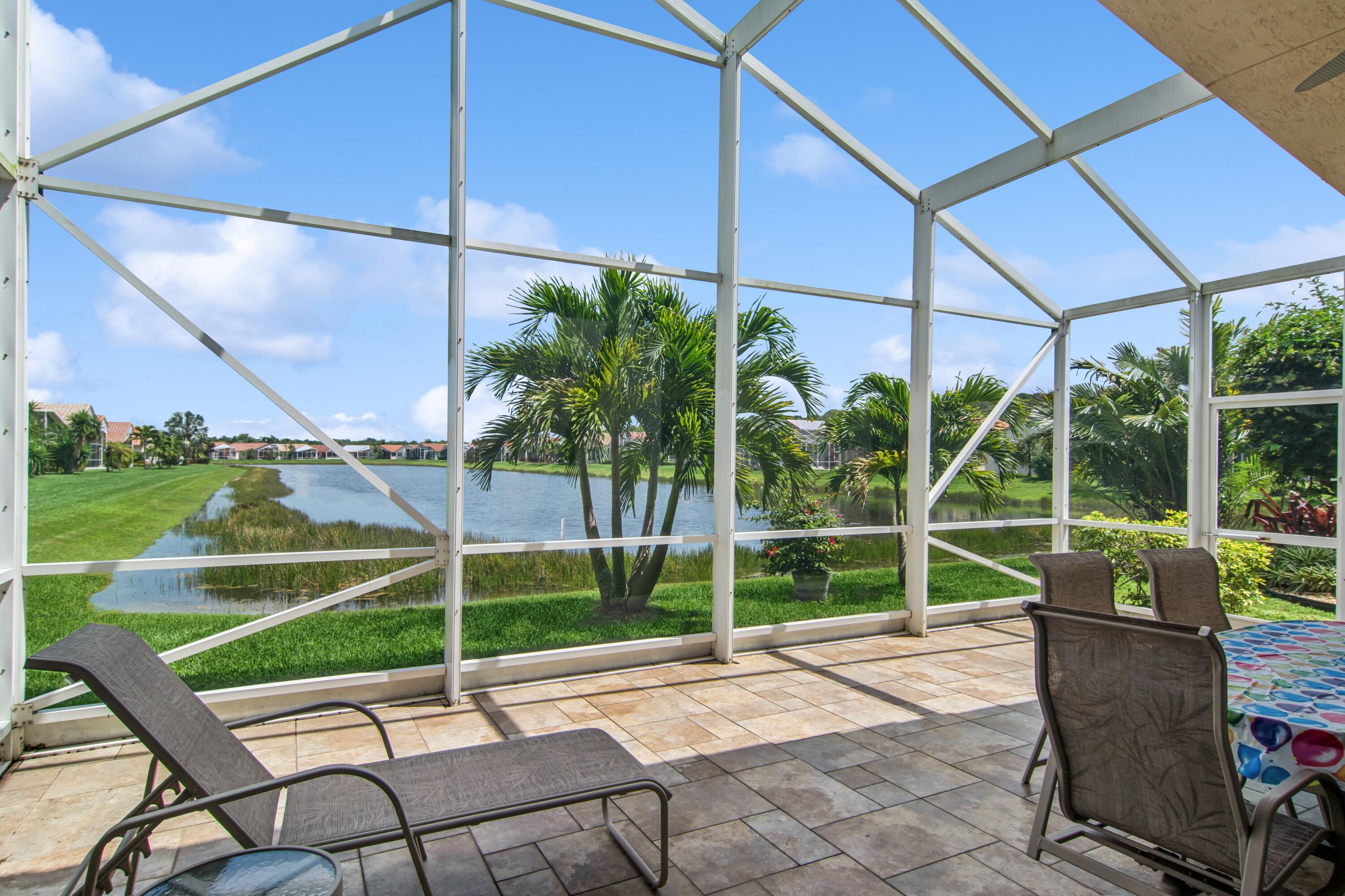 368 Springview Loop Port St. Lucie, FL 34986 - Photo 19 of 44 Screened Lanai w/Lake View