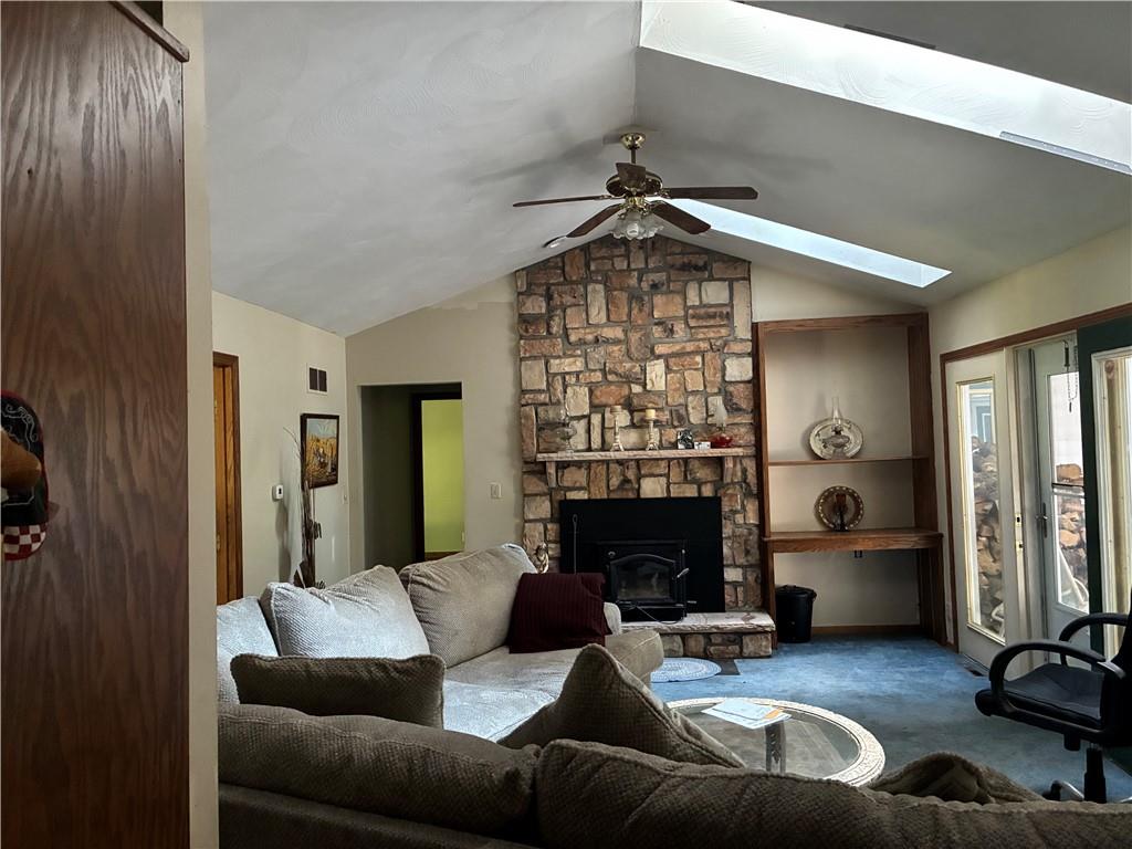 5569 East State Street Hermitage, PA 16148 - Photo 3 of 11 a living room with furniture and a fireplace
