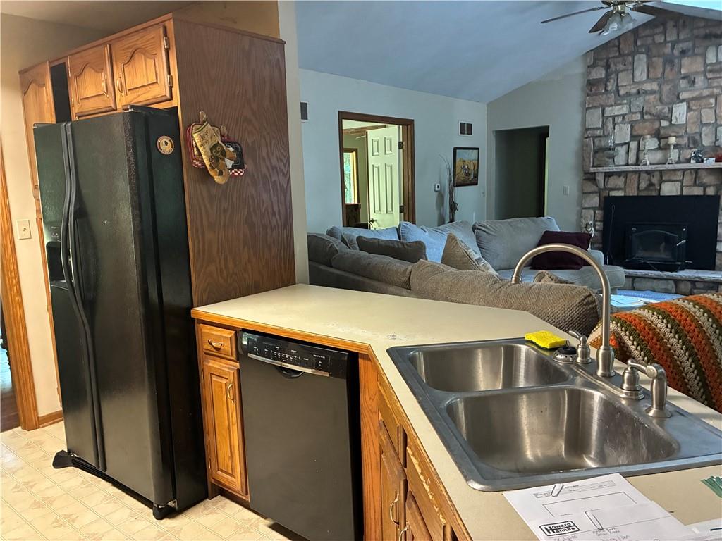 5569 East State Street Hermitage, PA 16148 - Photo 5 of 11 a kitchen with a refrigerator and a sink
