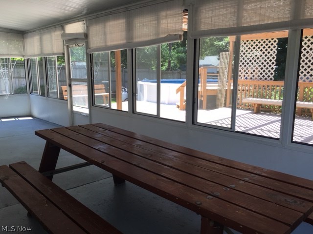 1160 Blanchester Road Lyndhurst, OH 44124 - Photo 15 of 19 Large enclosed sun room/patio with slider windows