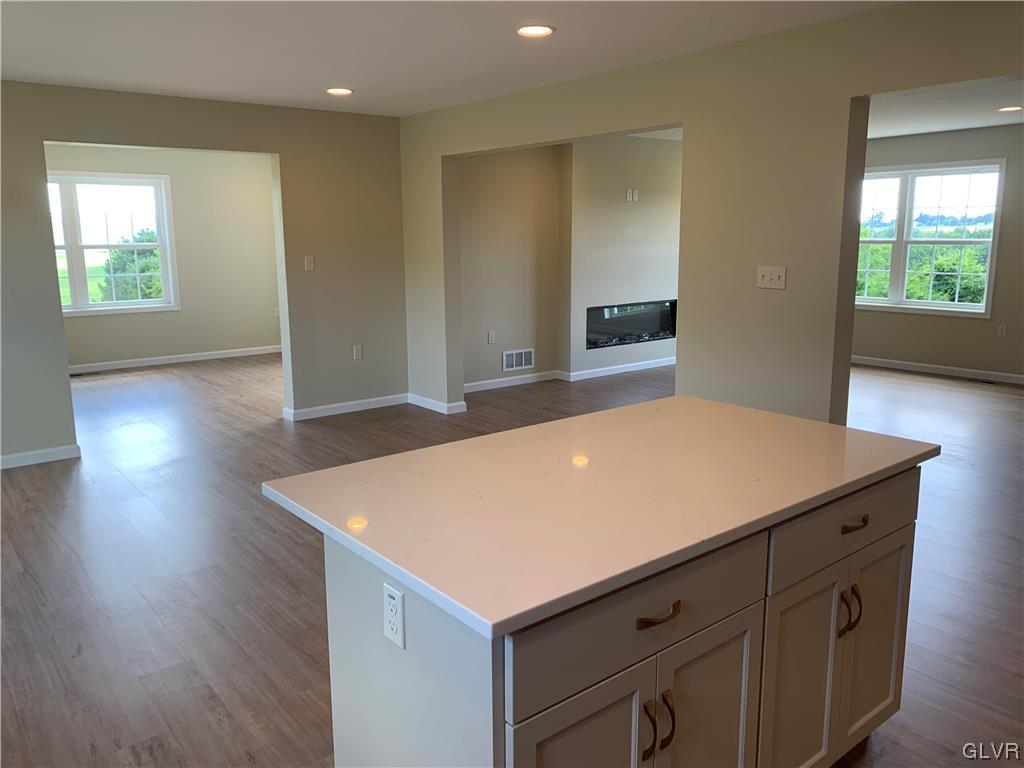 276 Hester Road Bangor, PA 18013 - Photo 12 of 26 a room with a wooden floor and windows